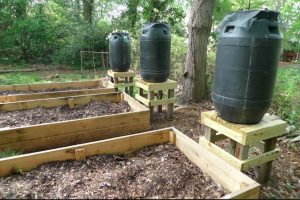 how to make a rain barrel system to water your survival garden