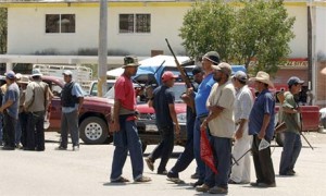 mexican vigilantes seize town arrest police officers