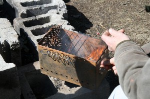 starting the fire for ammo can stove